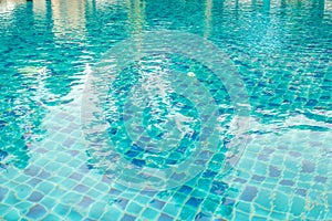Background texture of blue water in swimming pool