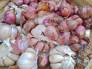 background texture from a collection of red onions and garlic