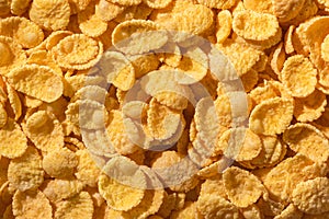 Background and texture of corn flakes. Morning breakfast
