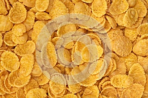 Background and texture of corn flakes. Top view