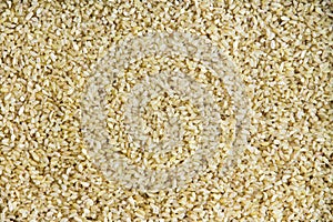 Background texture of cracked or crushed wheat