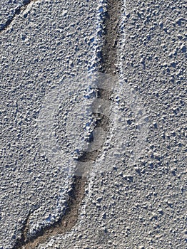 background, texture of cracks on asphalt