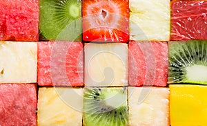 Background texture of diced tropical summer fruit