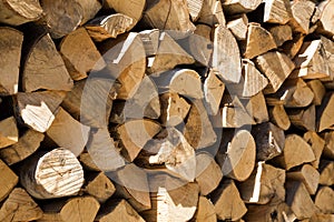 Background texture of dried cut and split logs