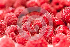 Background texture of dripping raspberry.