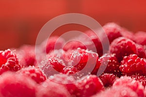 Background texture of dripping raspberry.