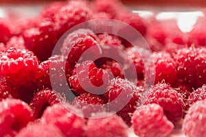 Background texture of dripping raspberry.