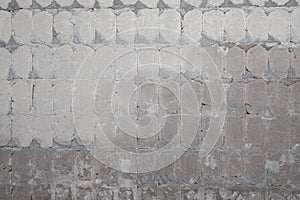 Background Texture: Empty Bathroom Wall with Removed Tiles for Renovation and Remodeling Project