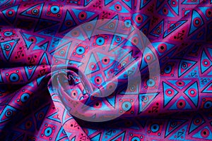 Background texture of folded silk in round shape