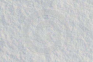 Background and texture of freshly fallen snow. The image is white. The snow is photographed from above