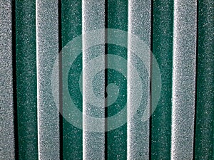 background, texture of a frozen fence
