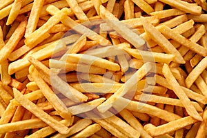 Background texture of golden French fries photo