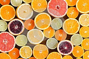 Background texture of mixed cut citrus fruit