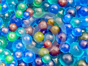 Background texture of multi-colored plastic balls on the playground