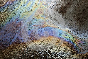 Background texture of an oil spill on road