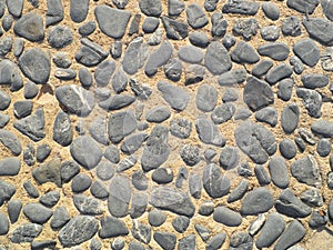 Background texture of old cobblestone road surface