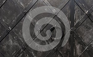 Background, texture of an old forged door