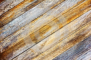 Background texture old gray barn board with diagonal wooden slats