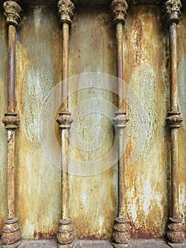 Background with texture old iron grilles on a door. Rusty wrought iron fence. Old metal grill