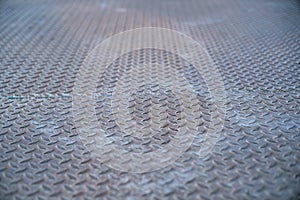 Background texture Of Old Metal Diamond Plate With Rusty