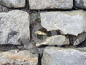 Background texture of old stone wall or cobblestones