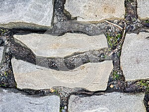 Background texture of old stone wall or cobblestones