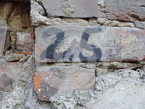 Background texture of old wall. with numbers 2 and 5, two, five, two and a half