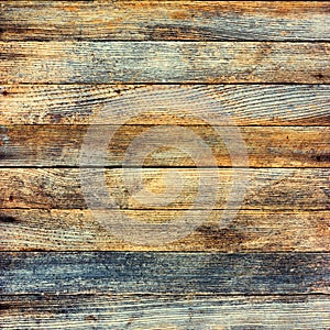 Background texture of an old wooden barn boards with retro toning