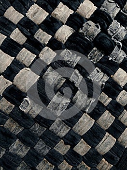 The background texture and pattern of the floor mat are made from white and dark blue patchwork