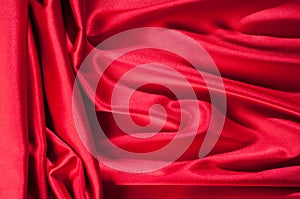 Background, texture, pattern Red Silk cloth of abstract backgrounds or wavy folds or satiny silk texture satin velvet material or
