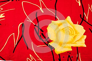 Background texture, pattern. Red silk fabric Yellow roses. Print