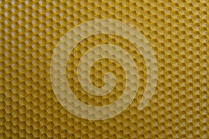 Background texture and pattern of section voshchina of wax honeycomb from a bee hive for filled with honey. Voshchina an