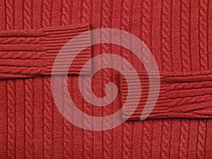 Background texture of red knitted wool fabric