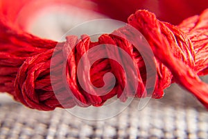 Background texture of red rope with knot. concept and design