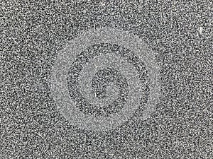 Background texture of rough asphalt. Grunge dark walpapers.