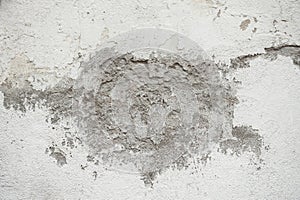 Background and texture of rough and broke white cement wall.