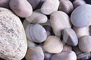 Background texture of smooth oceanic stones photo