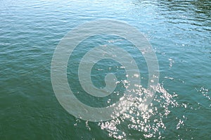 Background texture of sparkling rippling water