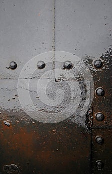 Background with the texture of wet gray metal with rust