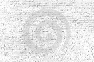 Background and texture white brick stone cladding wall photo