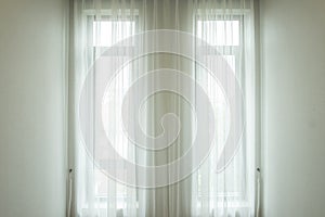 Background and texture of white drape at the window.