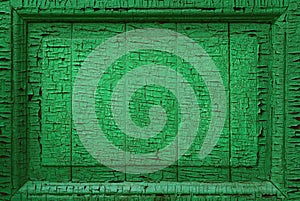 Background texture of wood surface with peeling green paint. Detail, fragment of an old wooden door