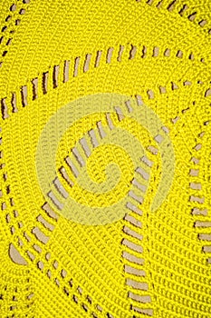 Background texture of yellow crochet fabric