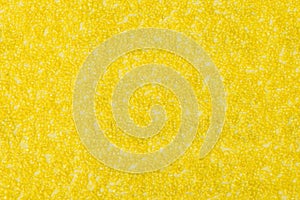 Background texture of yellow sandpaper