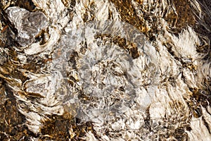 Background and textured of albumen in clear natural hot spring watercourse