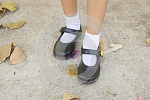 Background textured surface cement on the floors with shoes girl walking