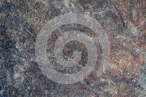 Background and textured of surface floor of large slabs of rock.