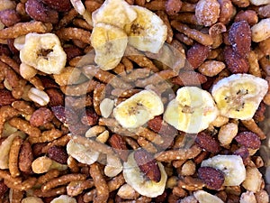 Background of trail mix with banana slices