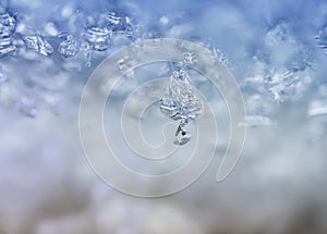 Background from transparent icicles and snowflakes