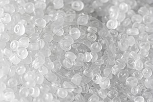 Background of transparent plastic granules. Abstract background